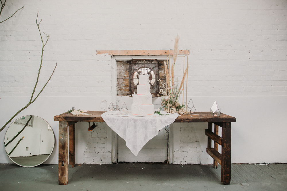 Boho Woodland Wedding with Black Wedding Cake and Autumnal Flowers