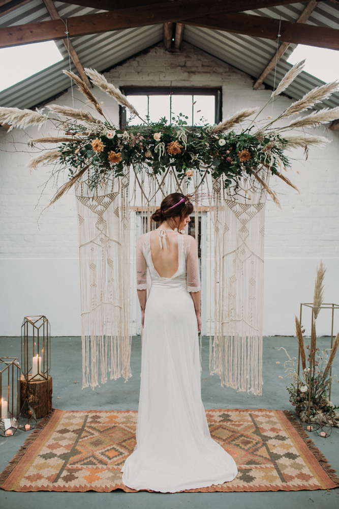 Boho Woodland Wedding with Black Wedding Cake and Autumnal Flowers