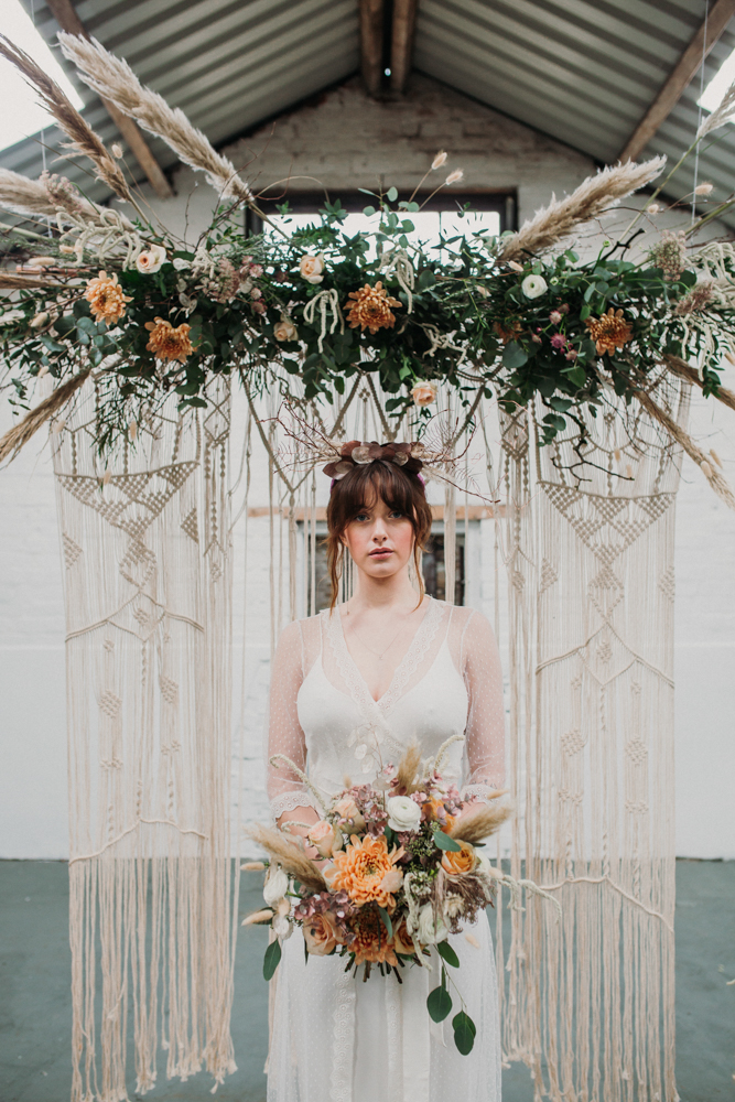 Boho Woodland Wedding with Black Wedding Cake and Autumnal Flowers