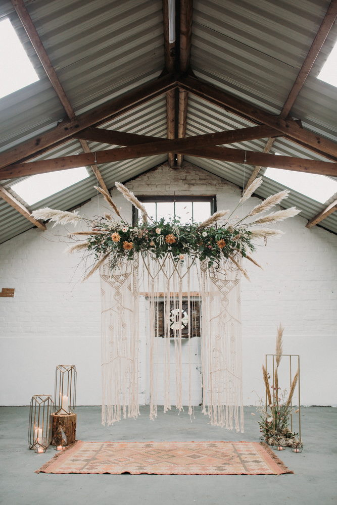 Boho Woodland Wedding with Black Wedding Cake and Autumnal Flowers