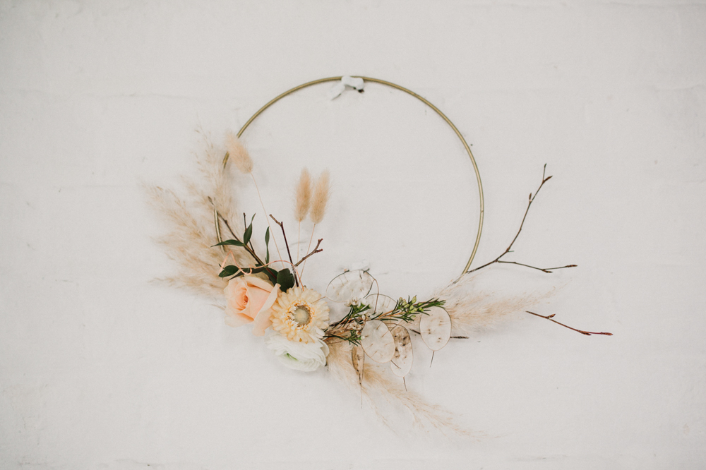 Boho Woodland Wedding with Black Wedding Cake and Autumnal Flowers