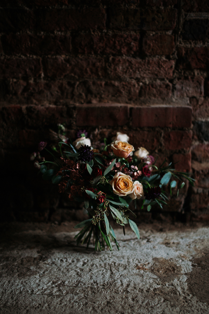 Boho Woodland Wedding with Black Wedding Cake and Autumnal Flowers