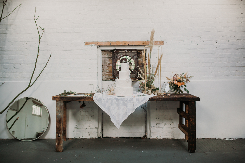 Boho Woodland Wedding with Black Wedding Cake and Autumnal Flowers