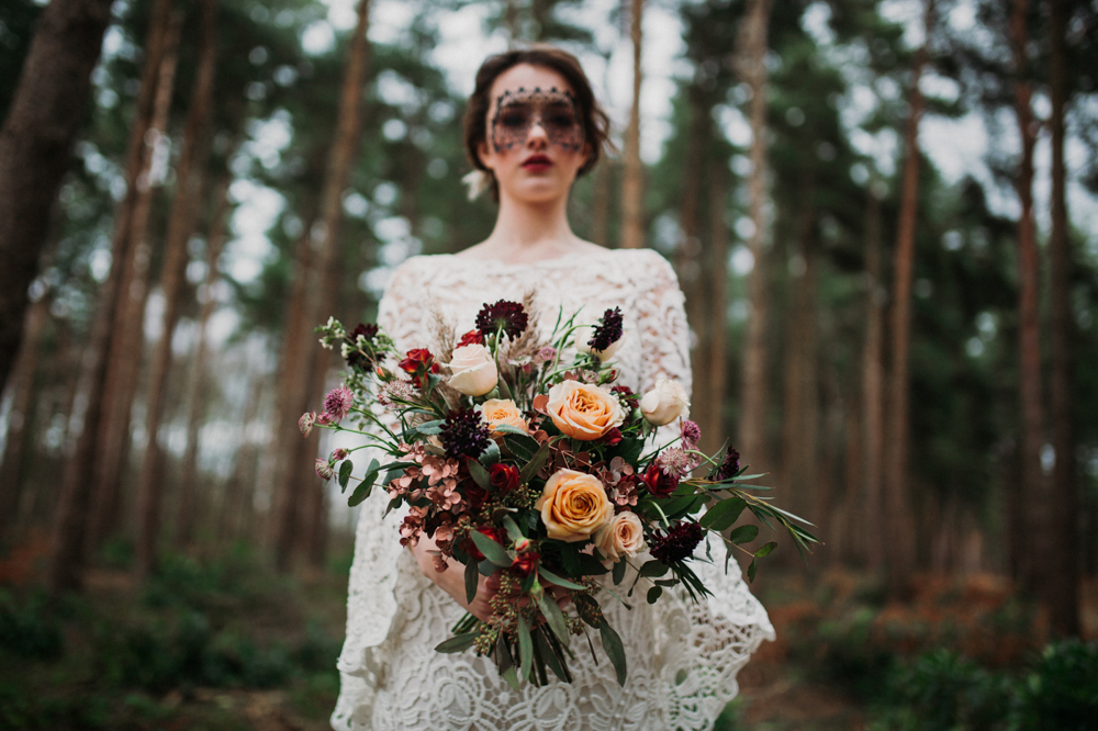 Boho Woodland Wedding with Black Wedding Cake and Autumnal Flowers