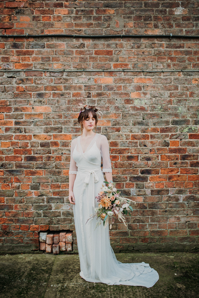 Boho Woodland Wedding with Black Wedding Cake and Autumnal Flowers