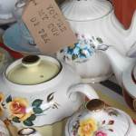 Vintage tea party china teapots and cups at a vintage wedding