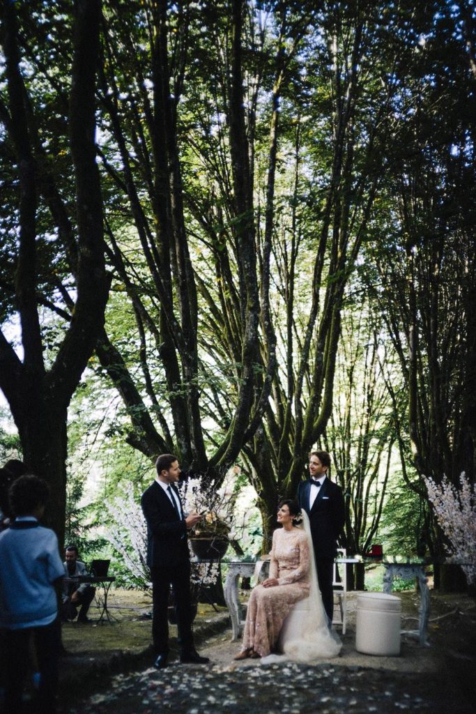 A magical Portuguese wedding with a pink lace dress & satin flowers