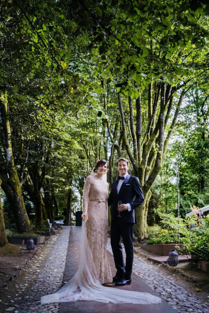 A magical Portuguese wedding with a pink lace dress & satin flowers