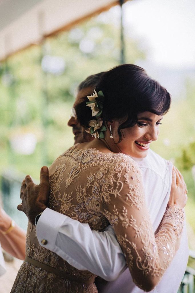 A magical Portuguese wedding with a pink lace dress & satin flowers
