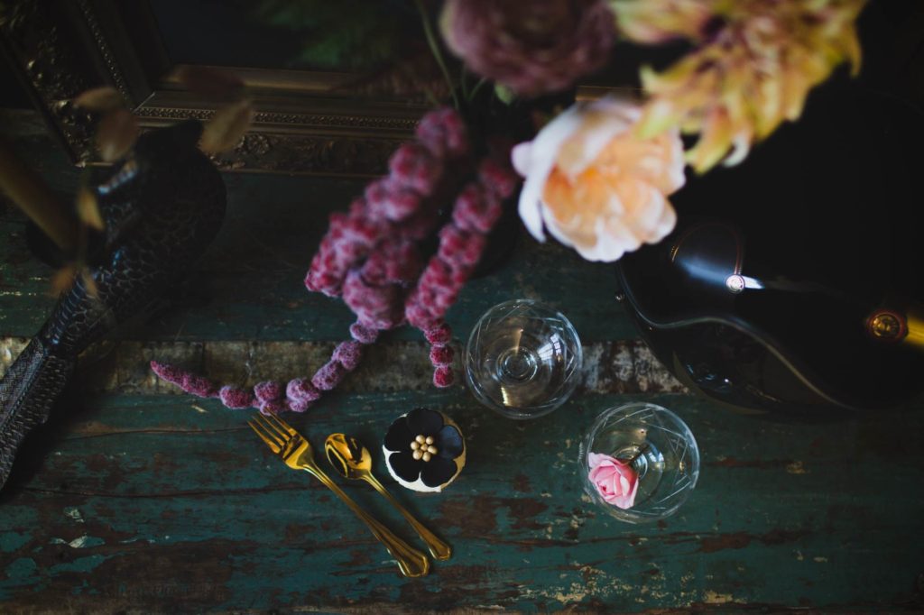 A dark, moody wedding shoot with a painted leather jacket