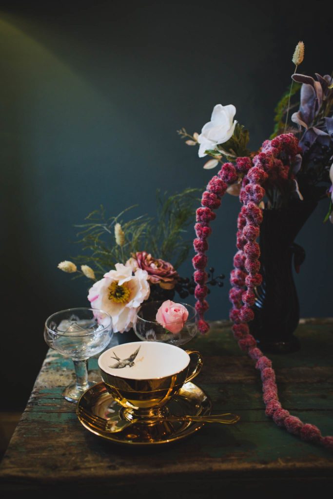 A dark, moody wedding shoot with a painted leather jacket