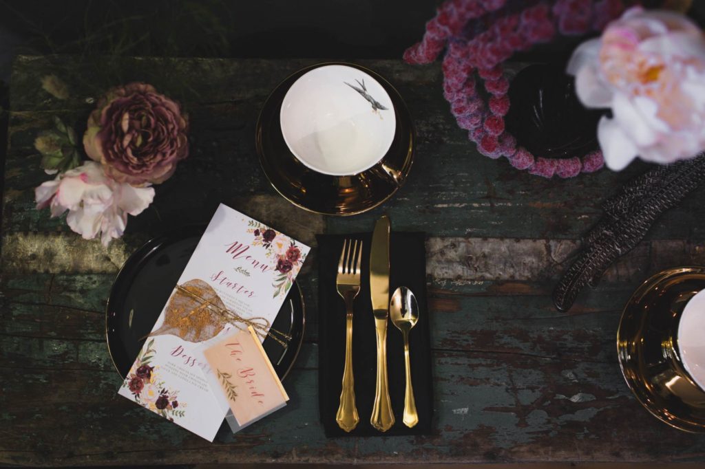 A dark, moody wedding shoot with a painted leather jacket