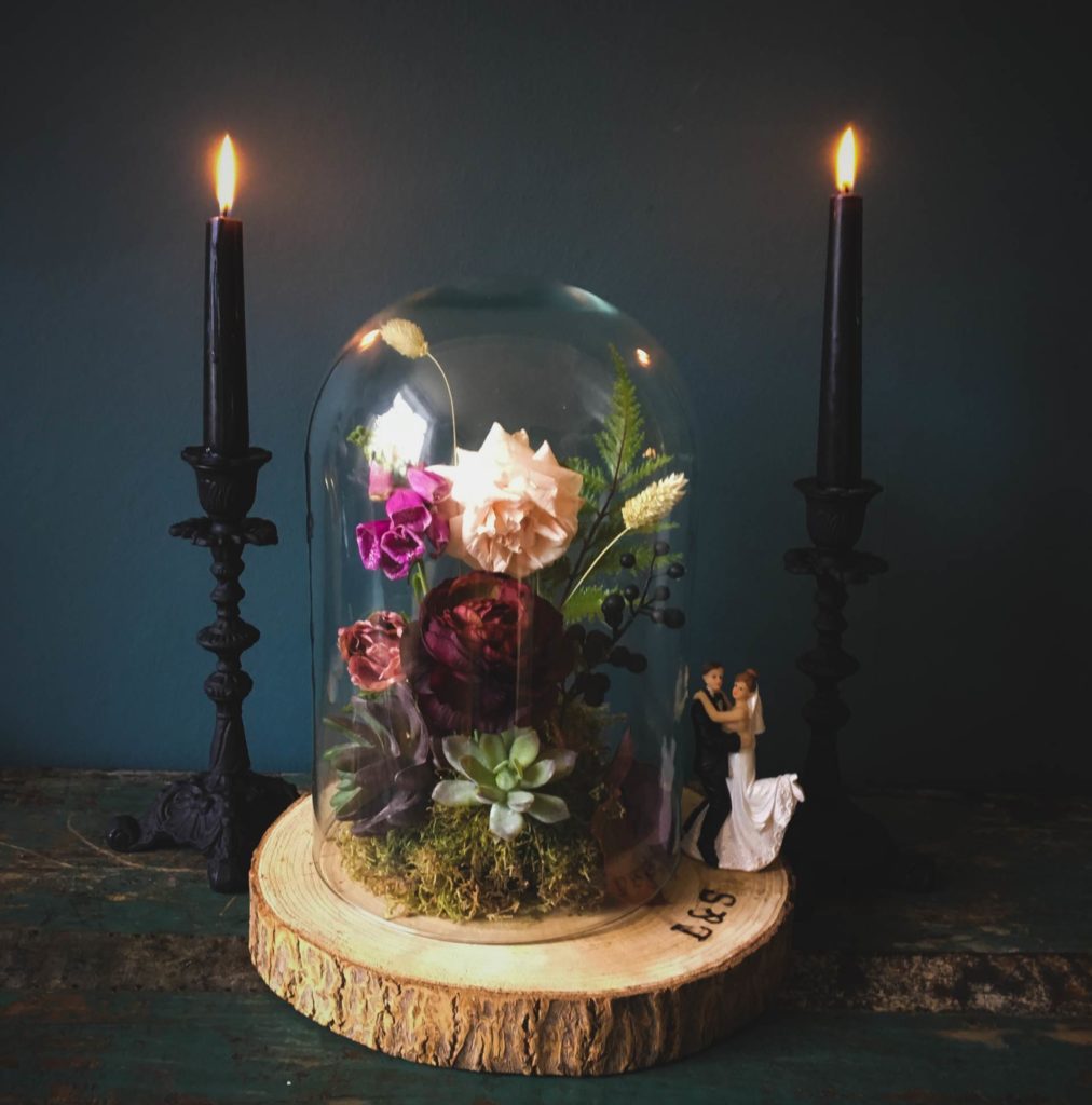 A dark, moody wedding shoot with a painted leather jacket