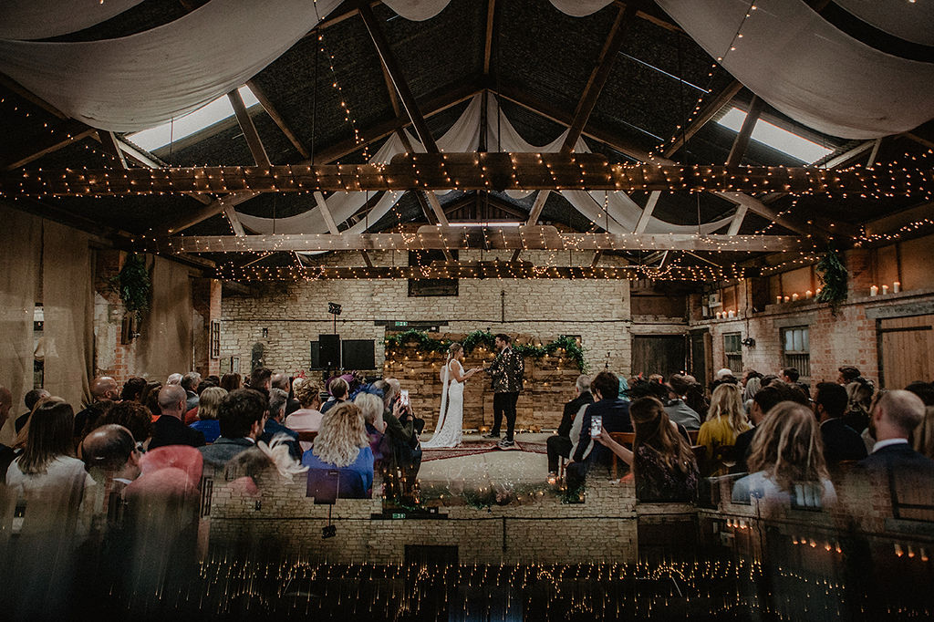 Rustic Barn Wedding with Disco Suits and Cool Urban Vibes