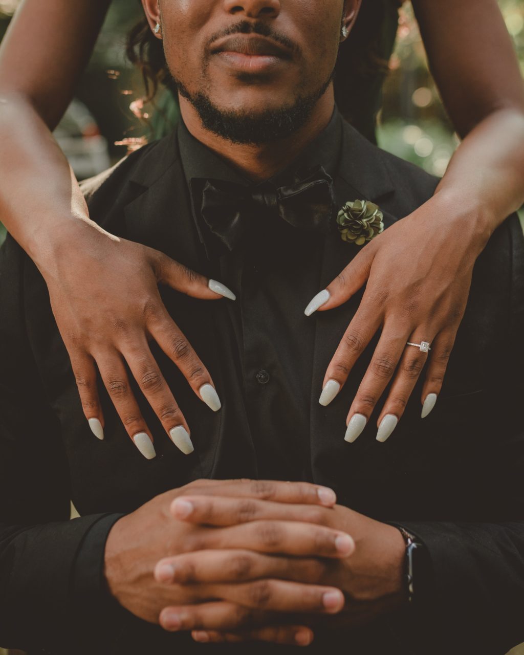 Engagement ring on BAME couple