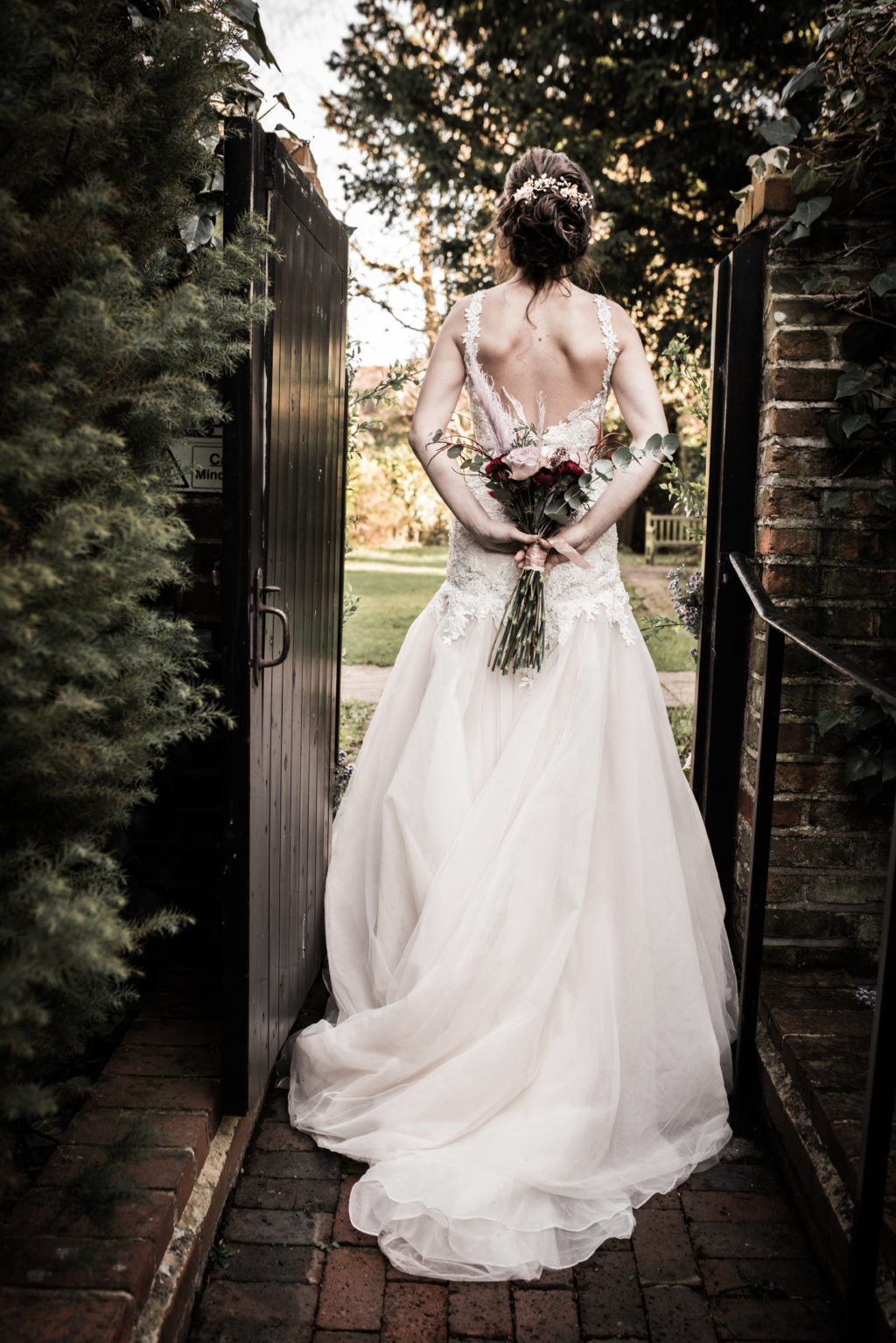 Classic Rock Wedding with Black Wedding Cake and Alternative Groom Style