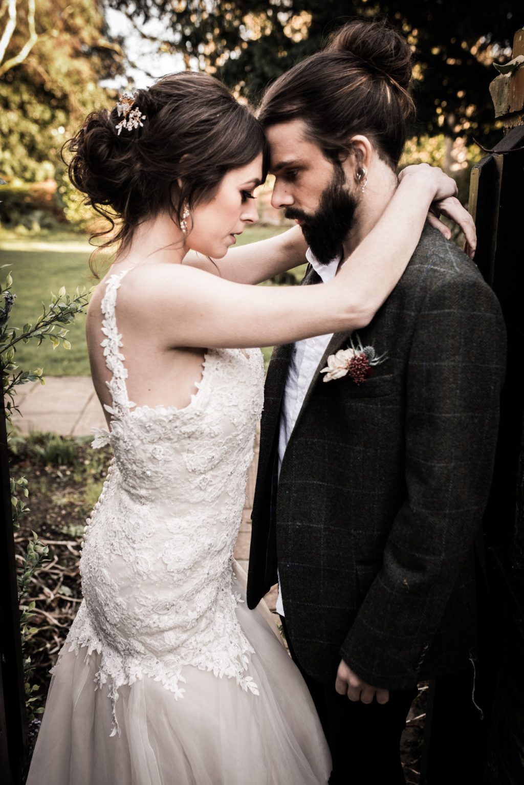 Classic Rock Wedding with Black Wedding Cake and Alternative Groom Style