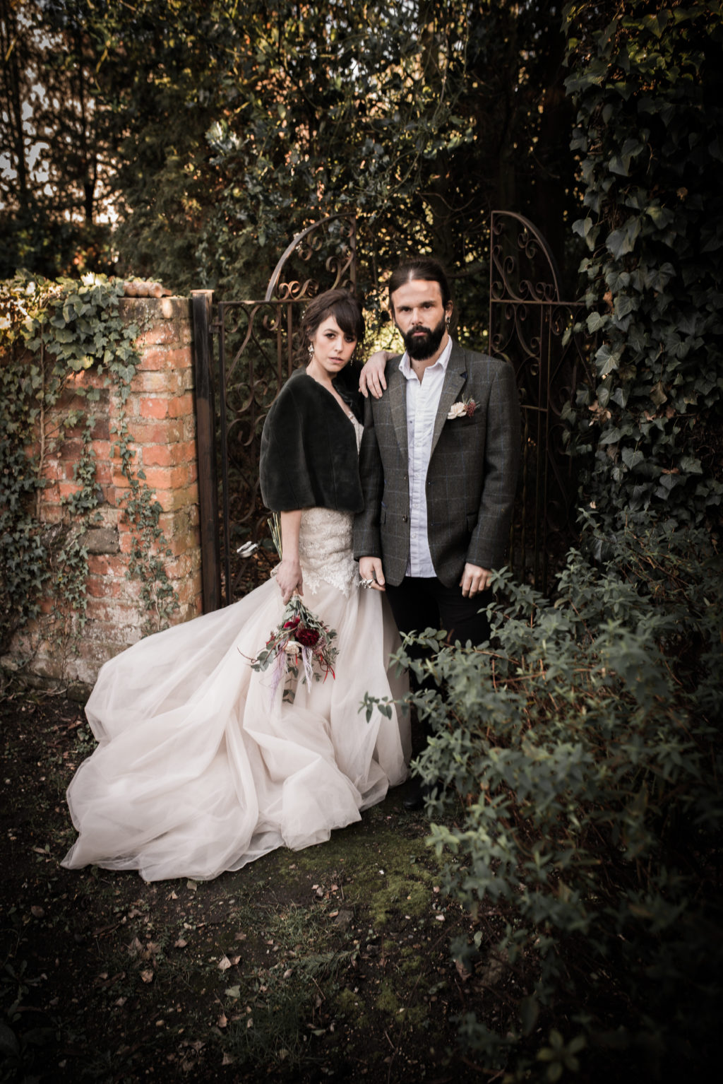 Classic Rock Wedding with Black Wedding Cake and Alternative Groom Style