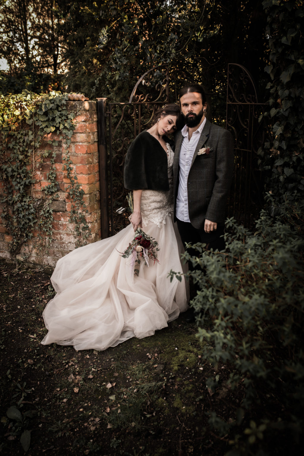 Classic Rock Wedding with Black Wedding Cake and Alternative Groom Style