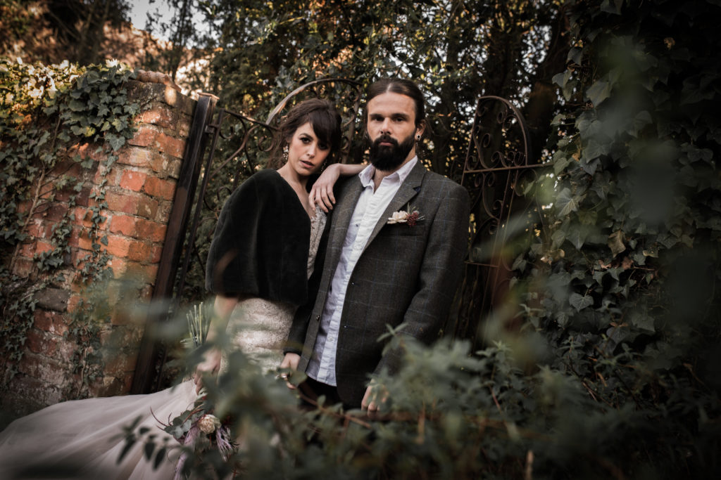 Classic Rock Wedding with Black Wedding Cake and Alternative Groom Style