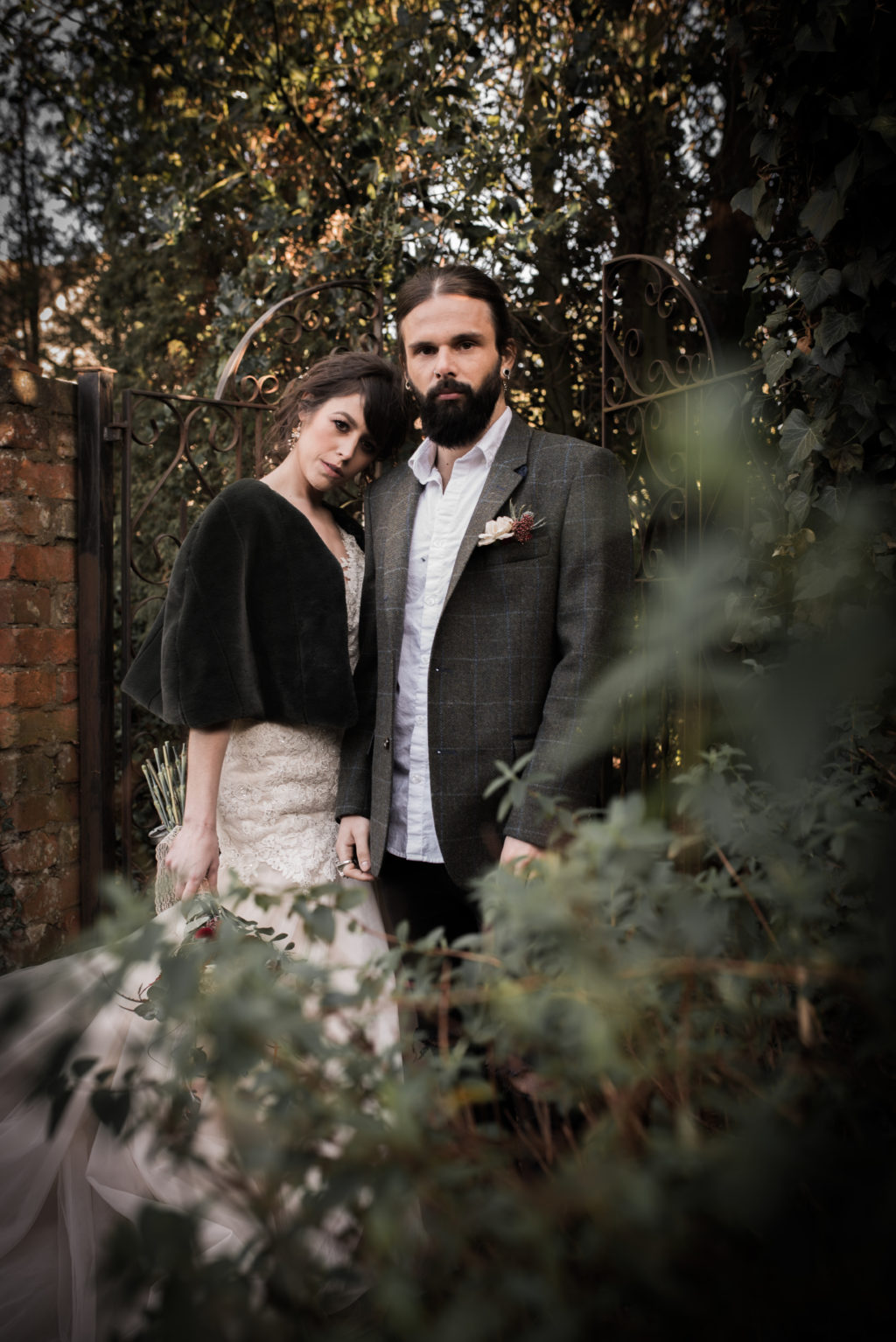 Classic Rock Wedding with Black Wedding Cake and Alternative Groom Style
