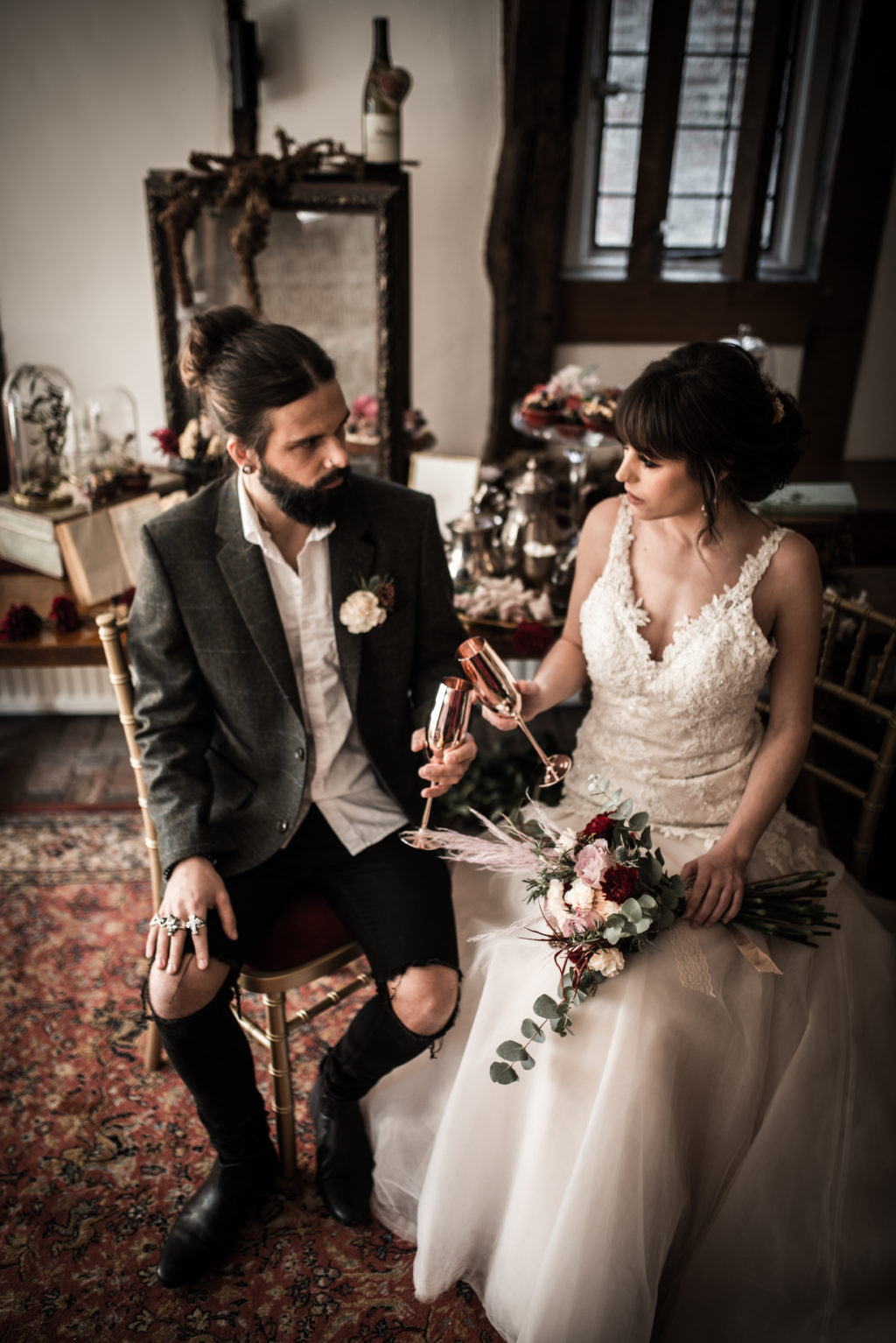 Classic Rock Wedding with Black Wedding Cake and Alternative Groom Style