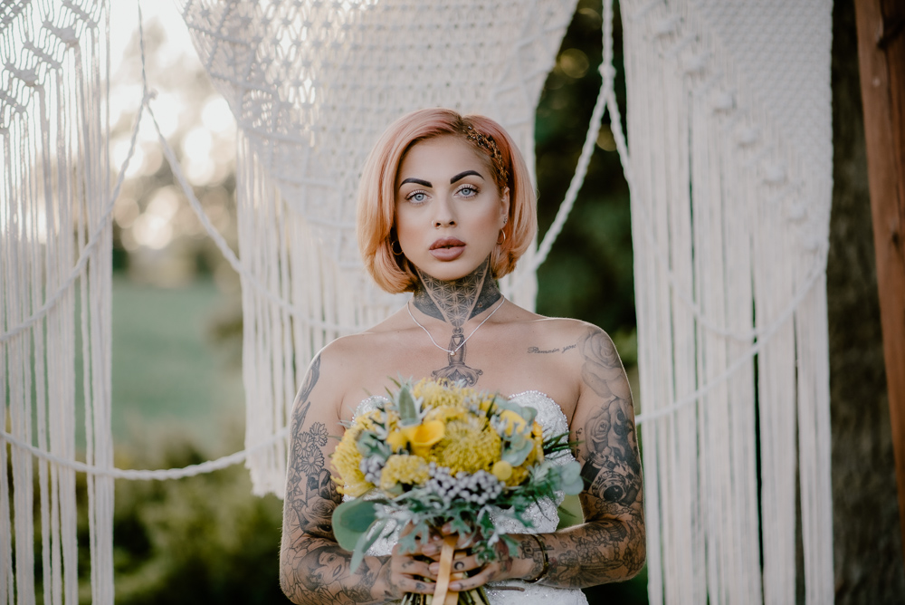 Lemon Yellow Wedding With Tattooed Bride and Black Wedding Cake