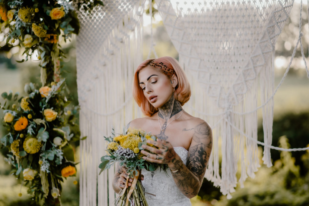 Lemon Yellow Wedding With Tattooed Bride and Black Wedding Cake