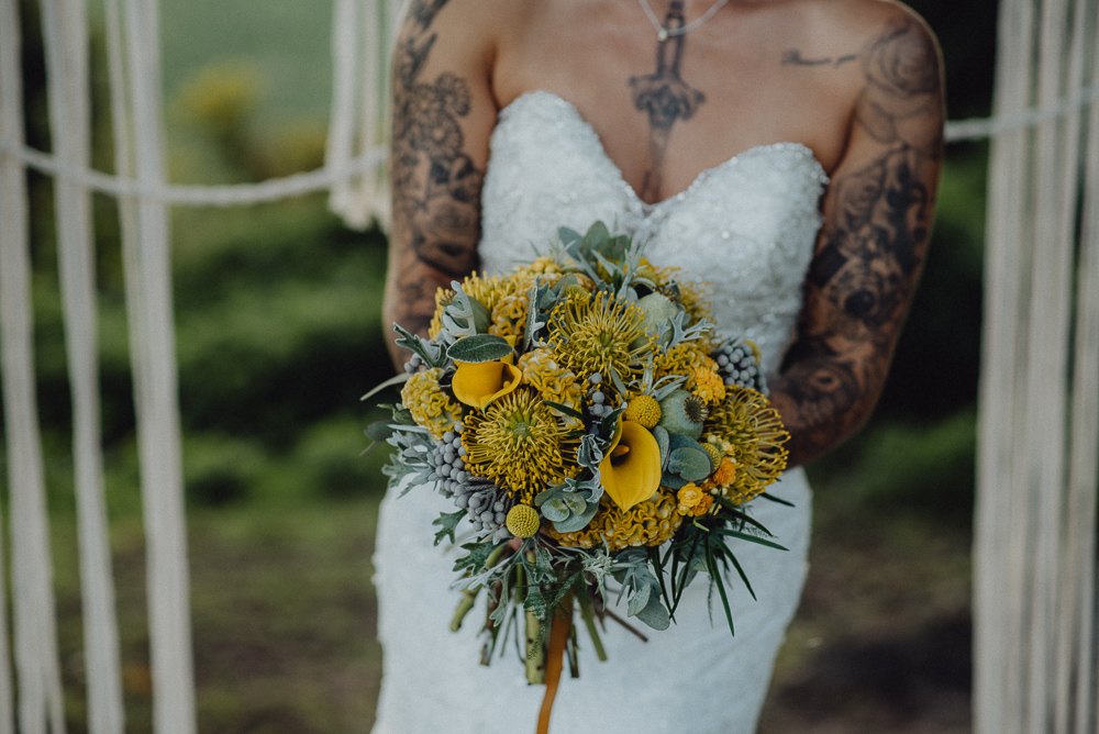 Lemon Yellow Wedding With Tattooed Bride and Black Wedding Cake