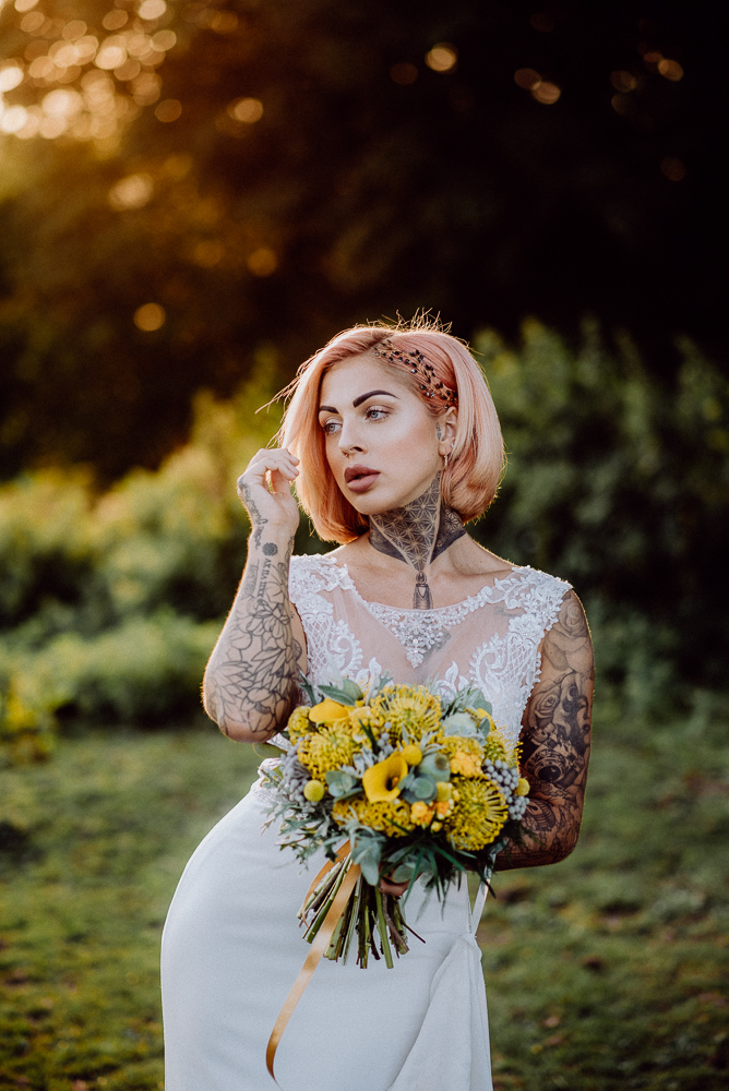 Lemon Yellow Wedding With Tattooed Bride and Black Wedding Cake