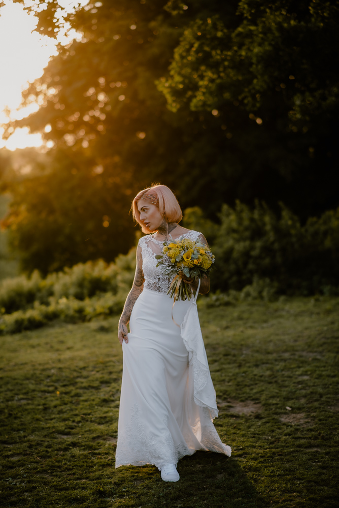 Lemon Yellow Wedding With Tattooed Bride and Black Wedding Cake