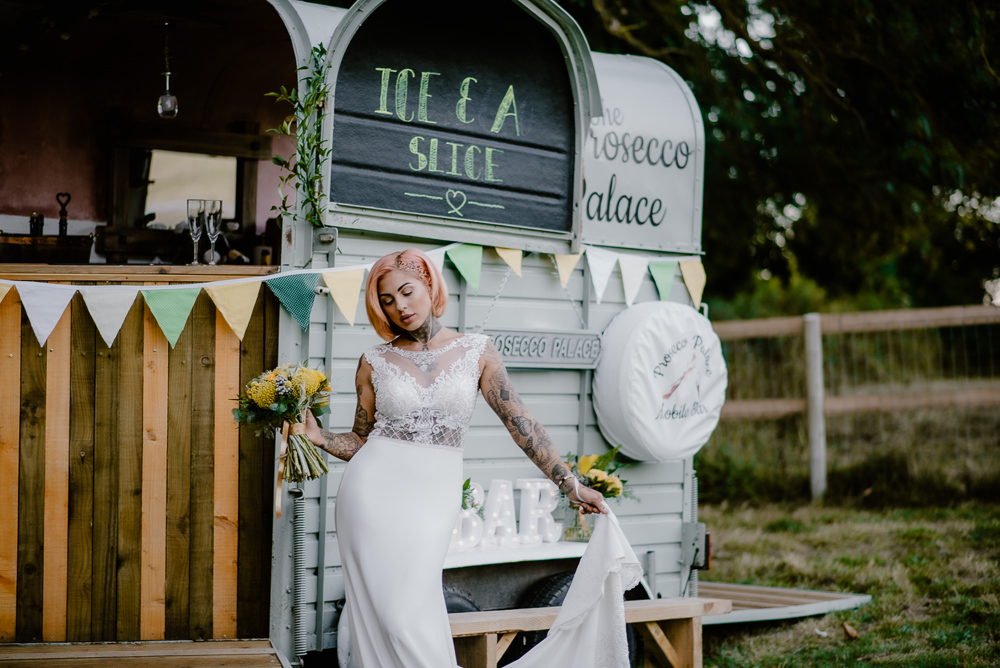 Lemon Yellow Wedding With Tattooed Bride and Black Wedding Cake