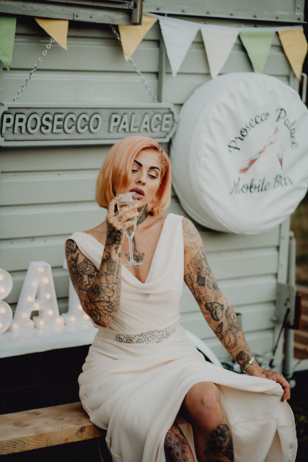 Lemon Yellow Wedding With Tattooed Bride and Black Wedding Cake