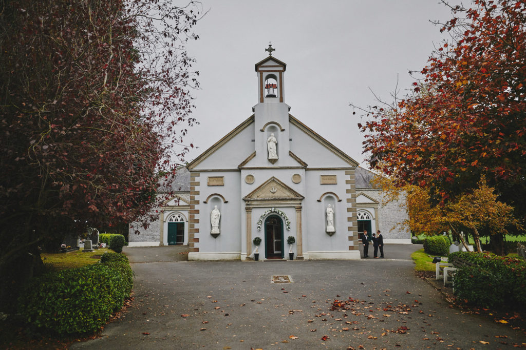 Traditional Irish Wedding with Black Tie Suits and A Navy and Gold Cake