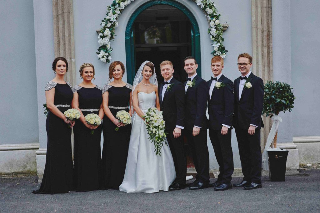 Traditional Irish Wedding with Black Tie Suits and A Navy and Gold Cake