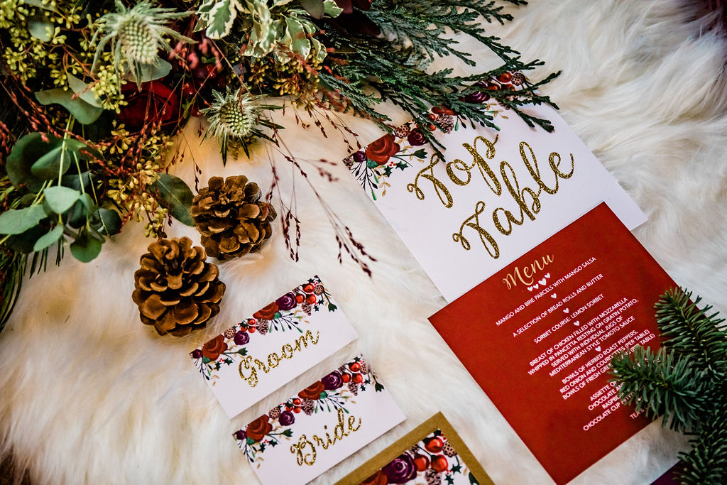 A Red and Gold Christmas Wedding With The Perfect Dinner Table At The Hundred House, Shropshire