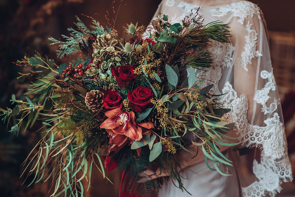 A Red and Gold Christmas Wedding With The Perfect Dinner Table At The Hundred House, Shropshire