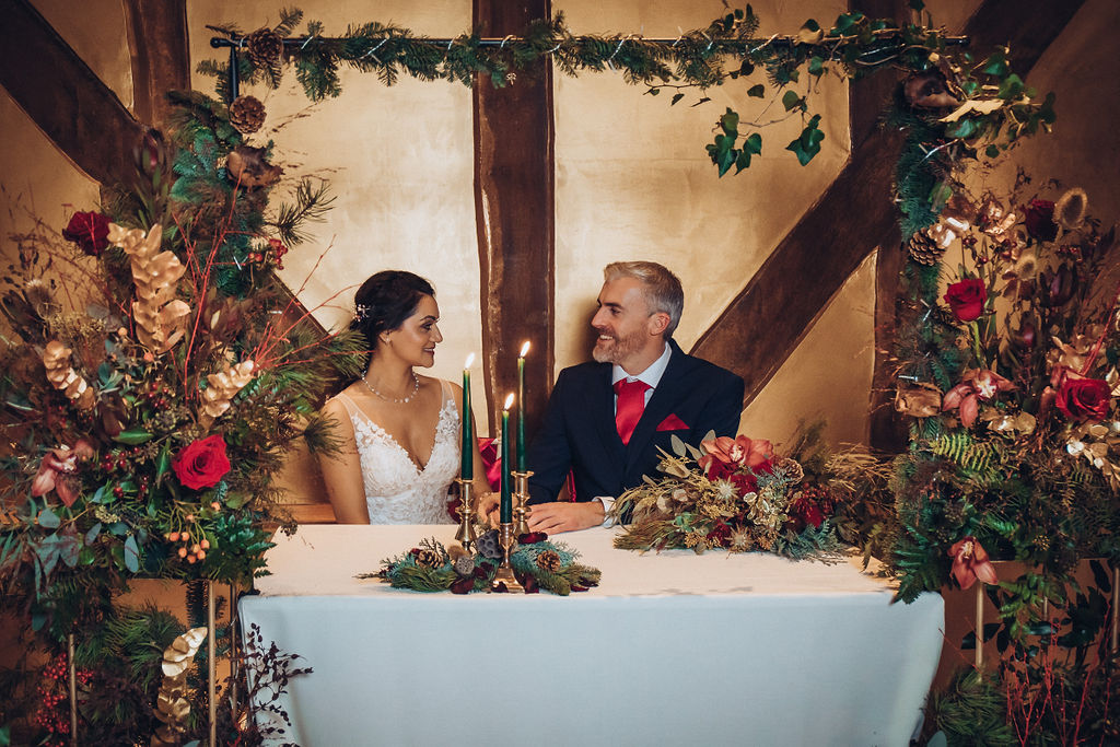 A Red and Gold Christmas Wedding With The Perfect Dinner Table At The Hundred House, Shropshire