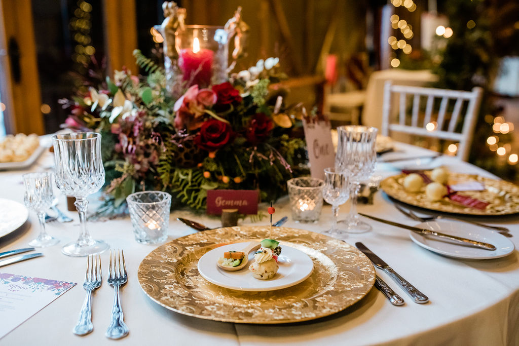 A Red and Gold Christmas Wedding With The Perfect Dinner Table At The Hundred House, Shropshire