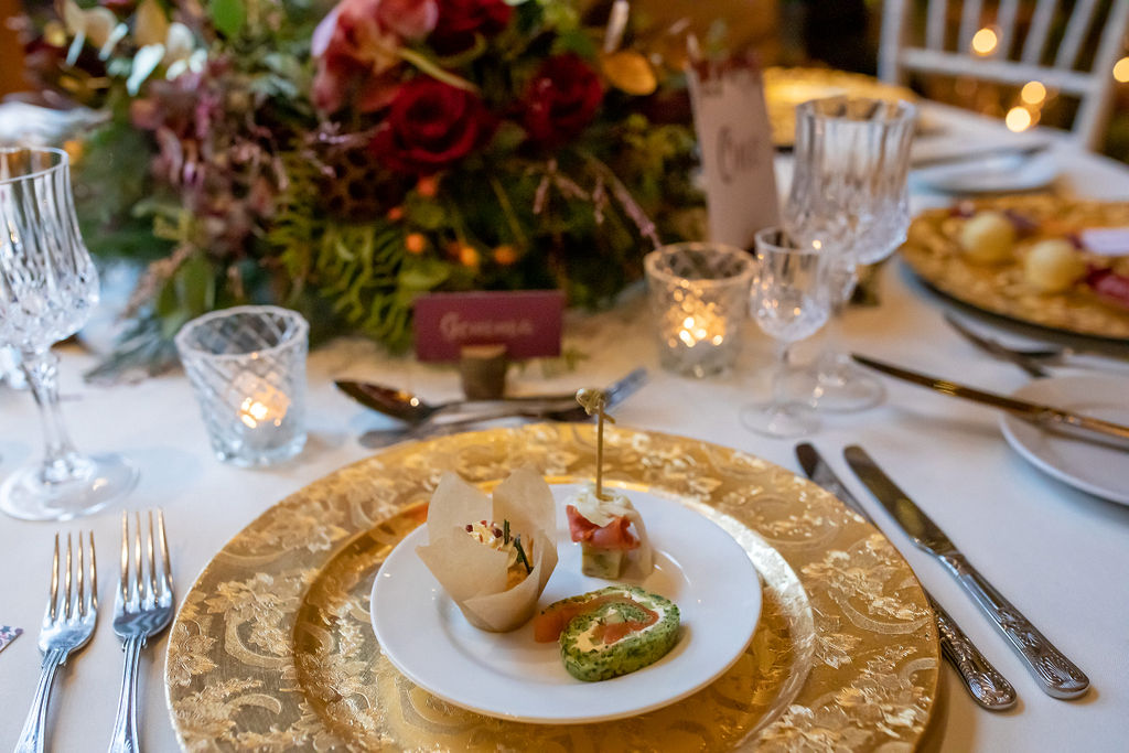 A Red and Gold Christmas Wedding With The Perfect Dinner Table At The Hundred House, Shropshire