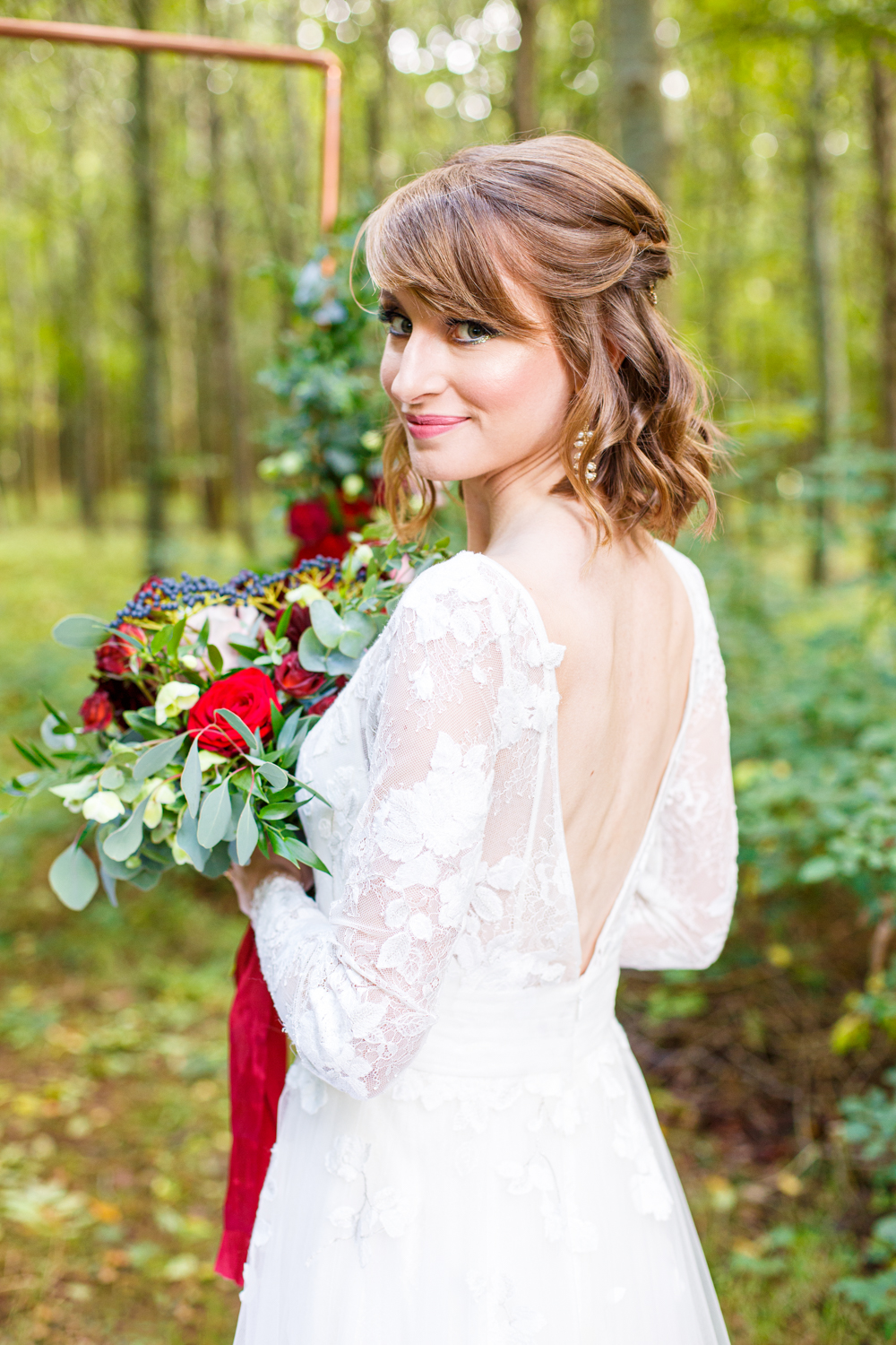 Woodland Wedding in The Cotswolds with Winter Red Styling and a Dog