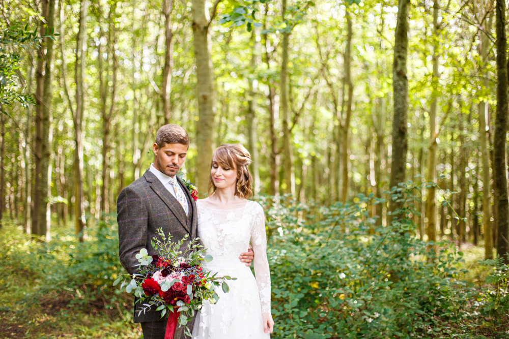 Woodland Wedding in The Cotswolds with Winter Red Styling and a Dog