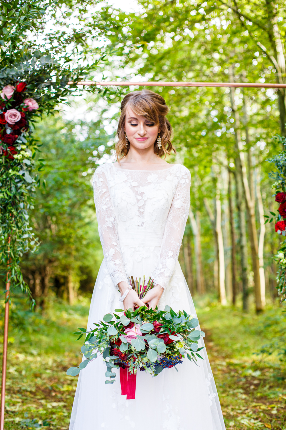 Woodland Wedding in The Cotswolds with Winter Red Styling and a Dog