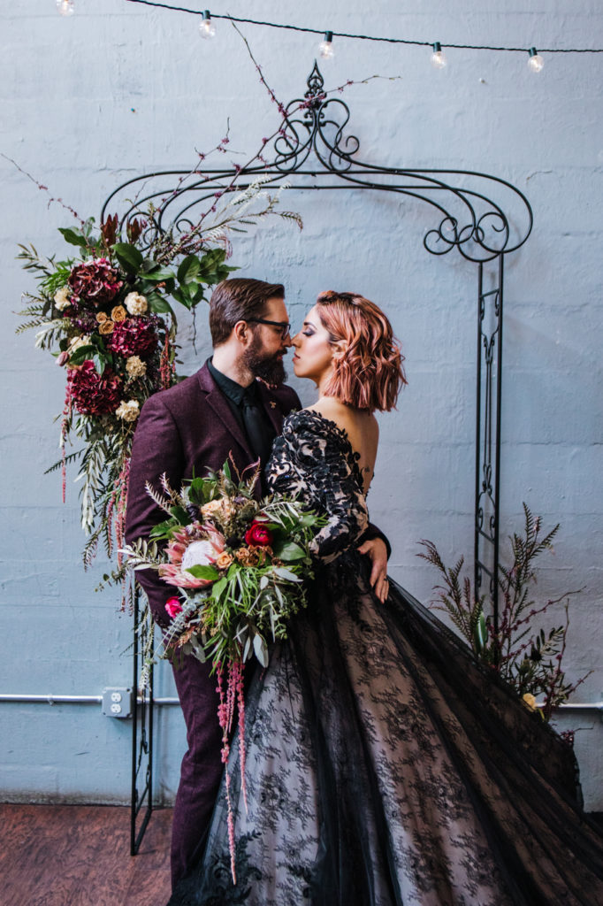 Dark Urban Wedding With Burgundy Styling and A Black Wedding Dress