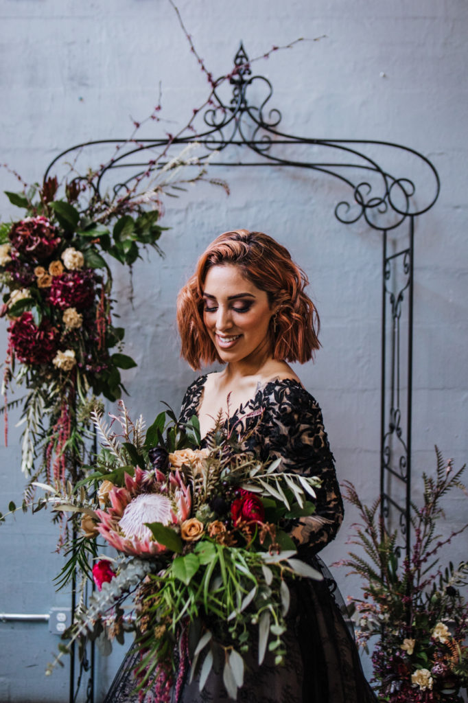 Dark Urban Wedding With Burgundy Styling and A Black Wedding Dress