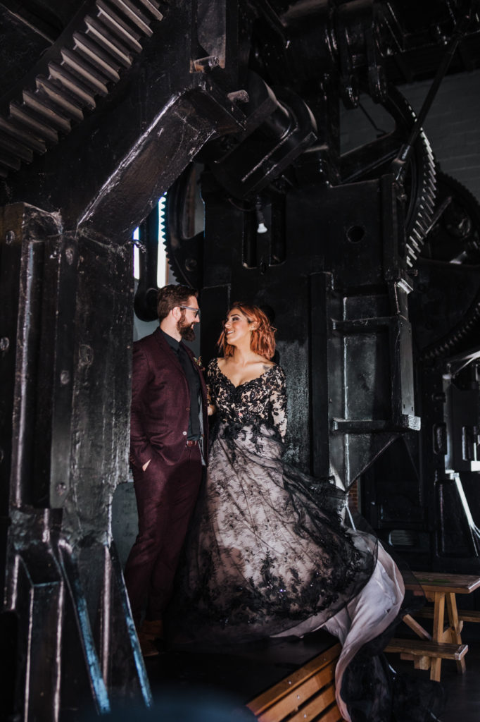 Dark Urban Wedding With Burgundy Styling and A Black Wedding Dress