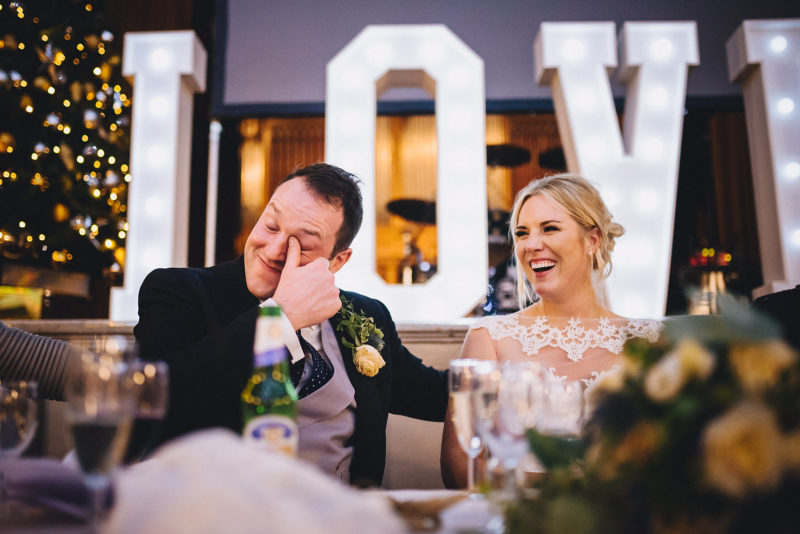 Bride and groom laugh to tears at their winter wedding speeches