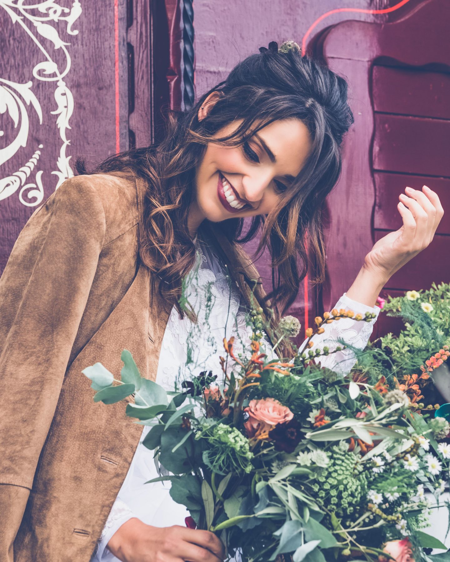 1970s Bohemian Bridal Inspiration With Field Flower Bouquets Cowboy Boots and Suede Jackets 