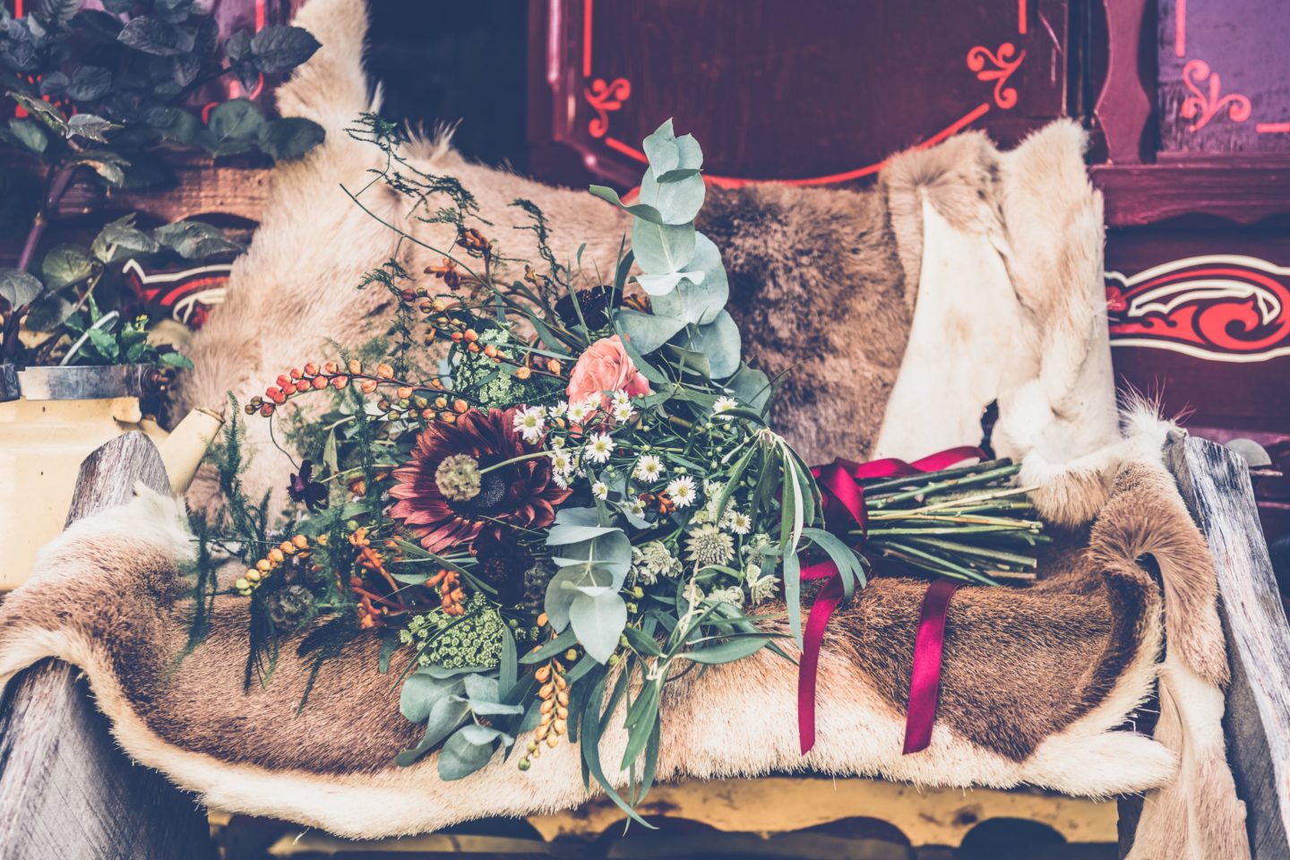 1970s Bohemian Bridal Inspiration With Field Flower Bouquets Cowboy Boots and Suede Jackets 