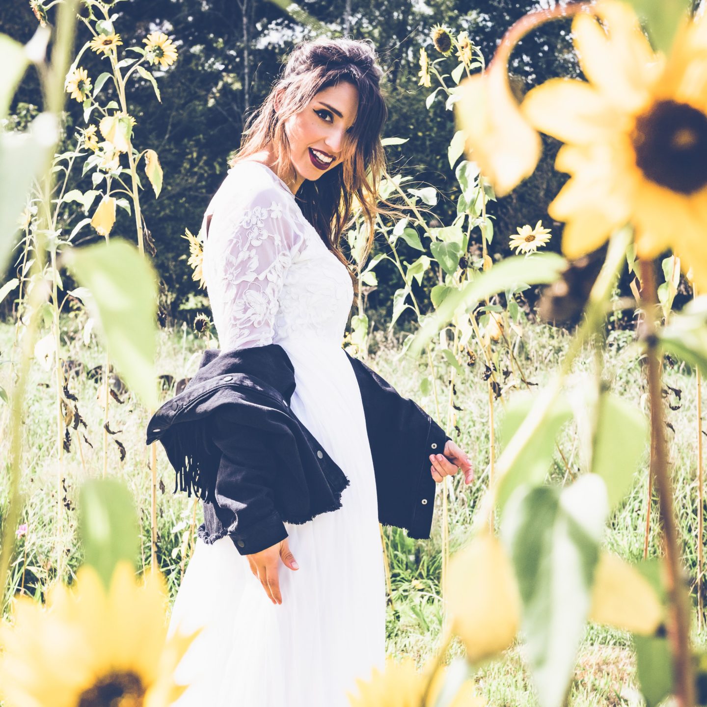 1970s Bohemian Bridal Inspiration With Field Flower Bouquets Cowboy Boots and Suede Jackets 